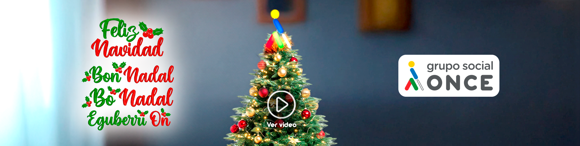 Feliz Navidad en las lenguas cooficiales y un árbol de Navidad en el centro con Oncelio arriba y logo Grupo Social ONCE